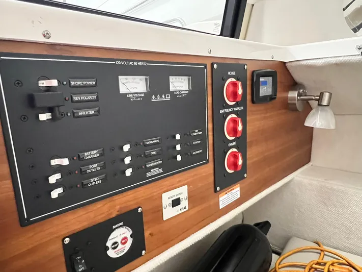  Yacht Photos Pics Electrical control panel inside a 2022 Cutwater C-24 Coupe boat.