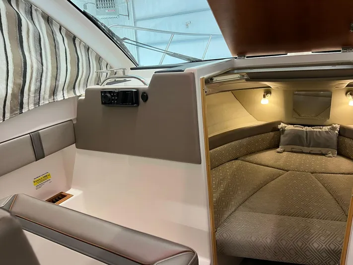  Yacht Photos Pics 2022 Cutwater C-24 Coupe interior with cozy cabin and modern design.
