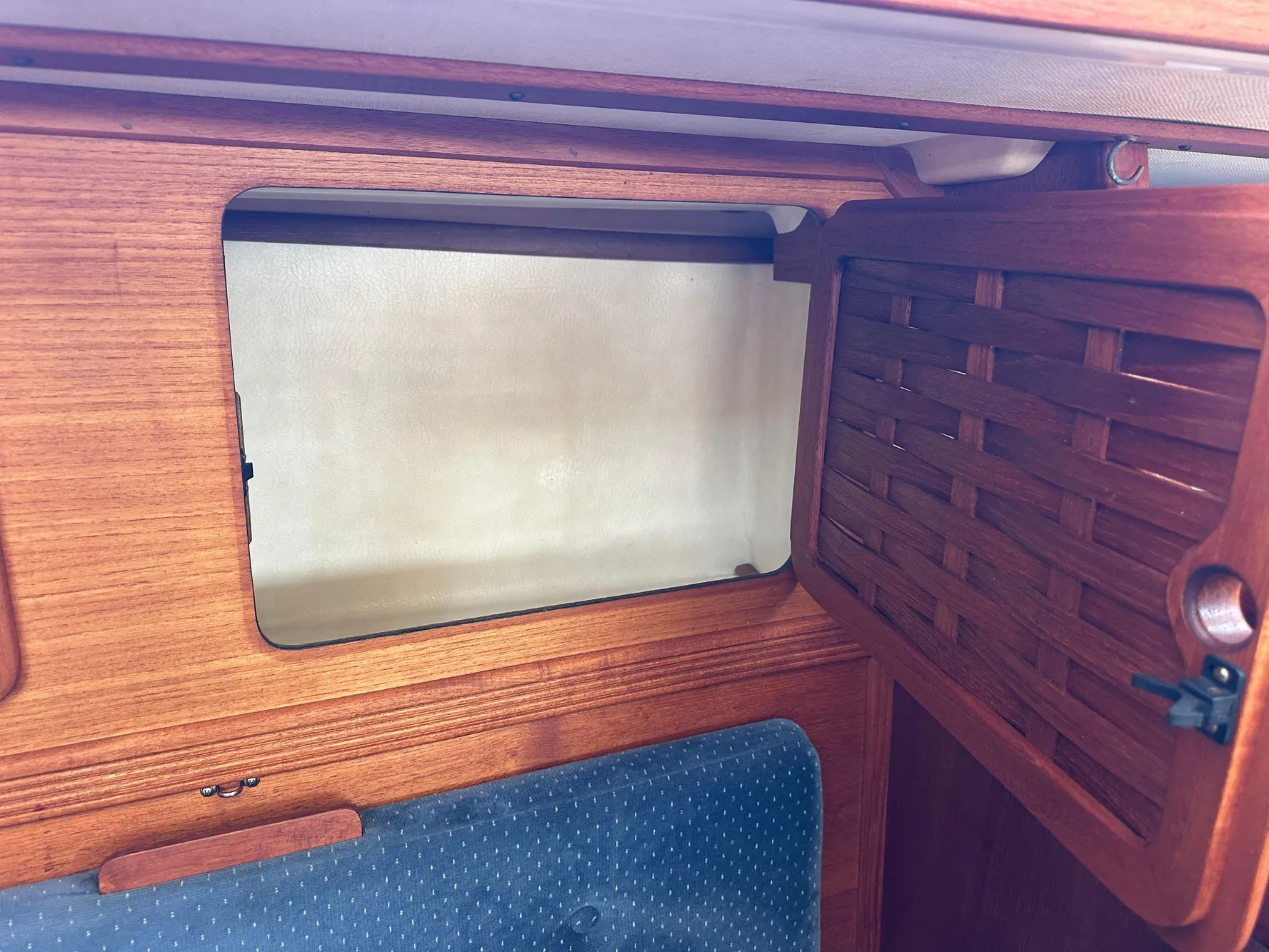 Wooden cabinet interior on a 1985 Sabre 34 MKI sailboat.