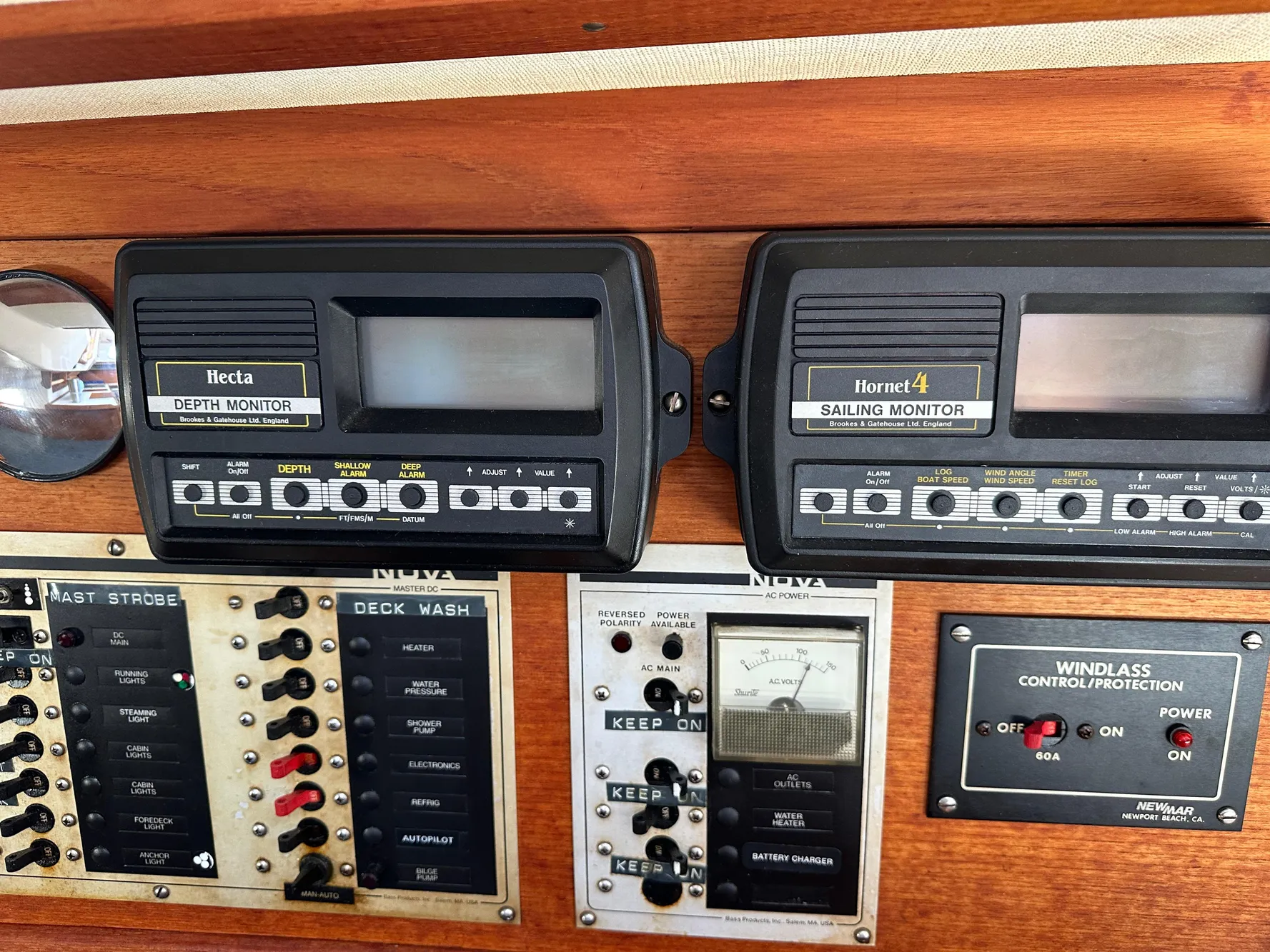 Control panel of a 1985 Sabre 34 MKI sailboat with depth and sailing monitors.