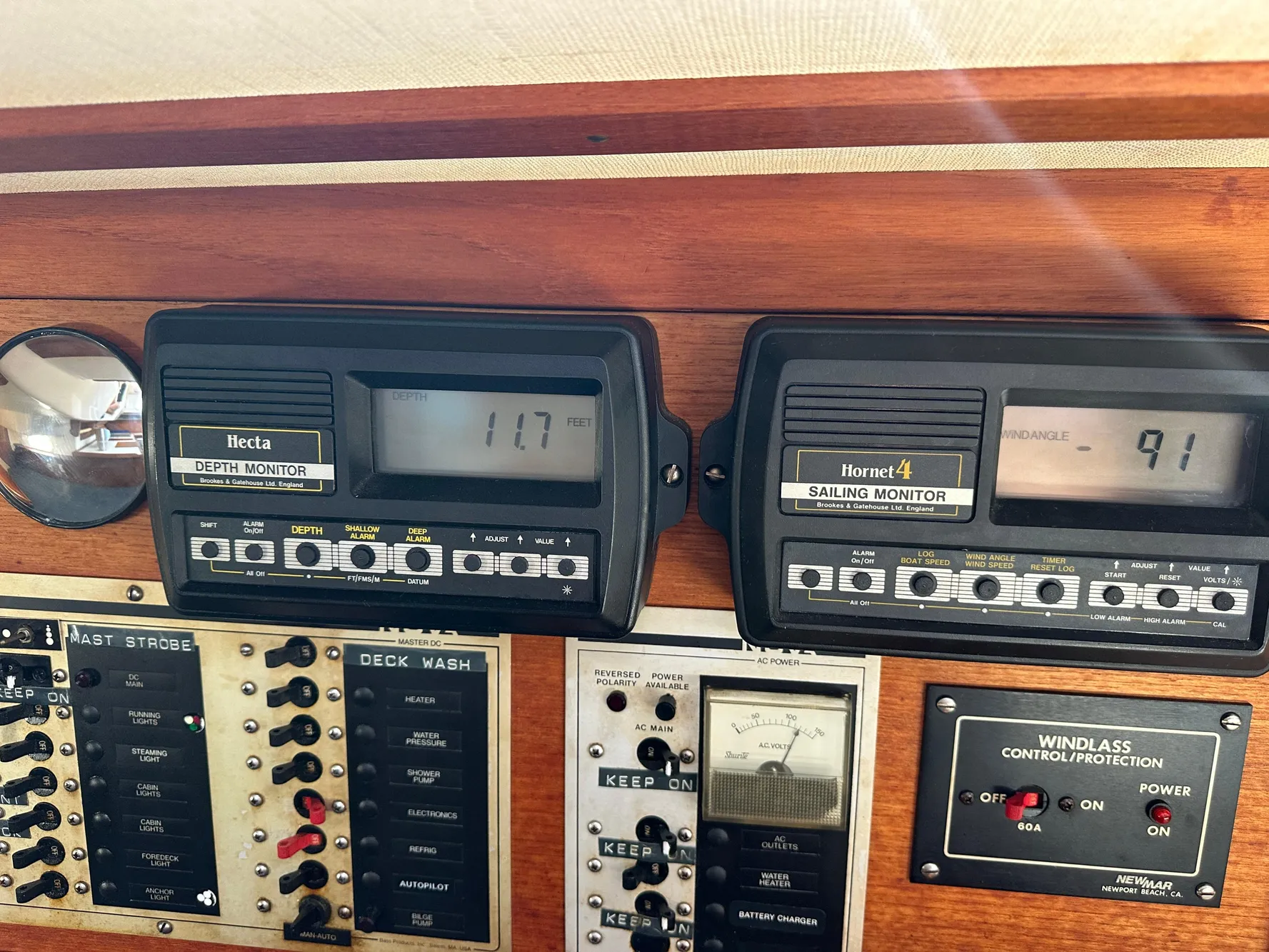 Control panel of a 1985 Sabre 34 MKI sailboat with depth and sailing monitors.