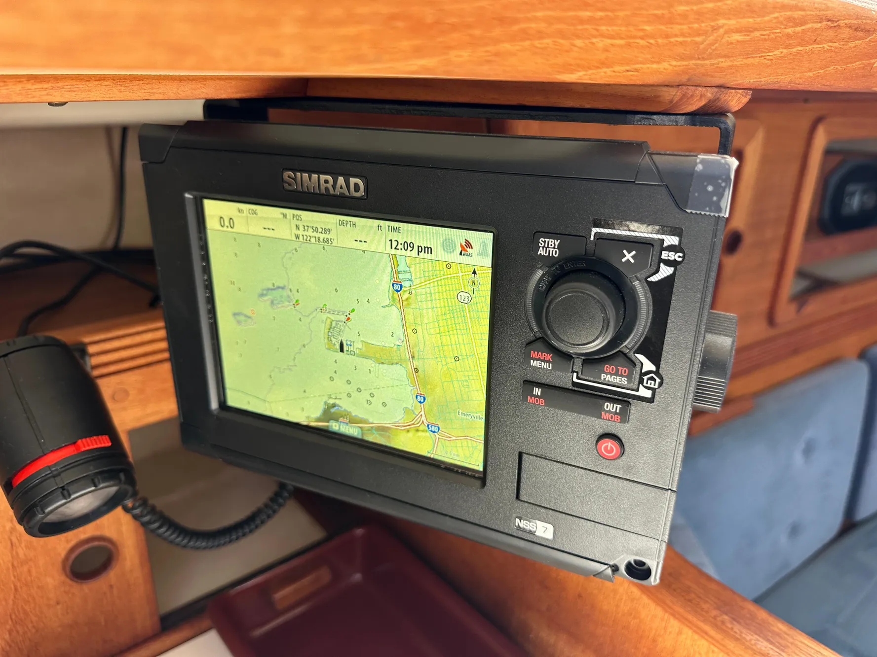 Simrad navigation system on 1985 Sabre 34 MKI sailboat, displaying nautical map.