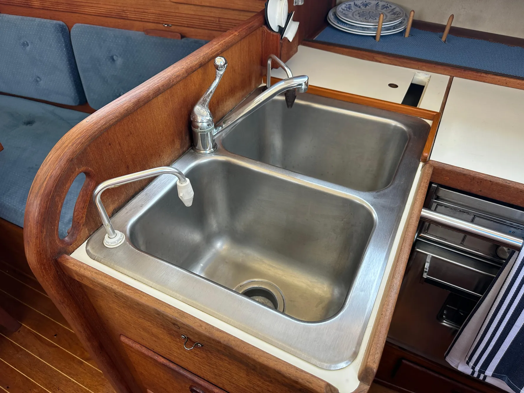 Stainless steel double sink in 1985 Sabre 34 MKI yacht galley.