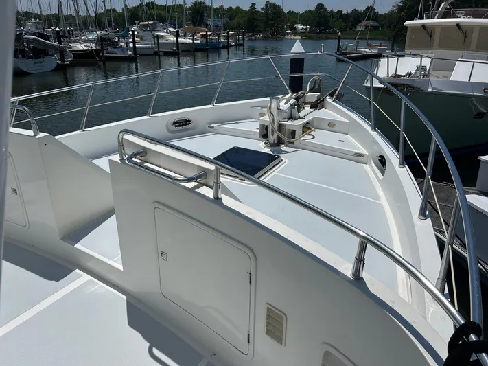 Duet Yacht Photos Pics Selene 43 yacht deck, 1999 model, docked at marina with clear skies.