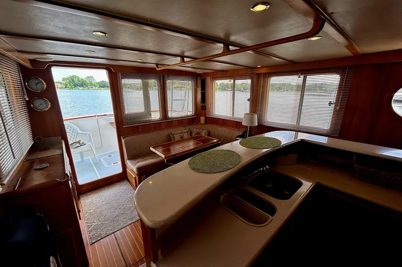 Duet Yacht Photos Pics Luxurious interior of 1999 Selene 43 yacht with scenic water view.