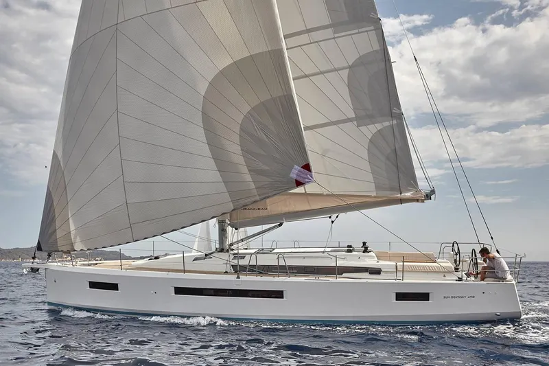  Yacht Photos Pics Manufacturer Provided Image: 2020 Jeanneau Sun Odyssey 490 sailing yacht on open water.