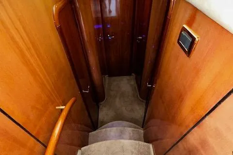 L Altro G Yacht Photos Pics Interior staircase of 2006 Cranchi Atlantique 48 yacht with wooden finish.