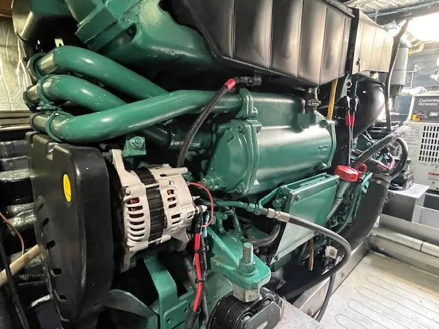 L Altro G Yacht Photos Pics Engine of 2006 Cranchi Atlantique 48 yacht, showcasing intricate mechanical components.