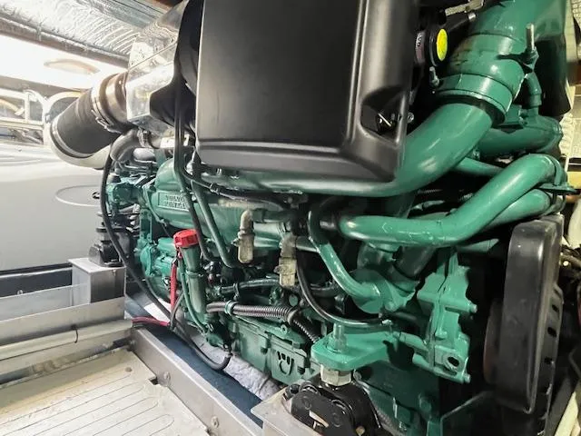 L Altro G Yacht Photos Pics Engine of 2006 Cranchi Atlantique 48 yacht, showcasing intricate mechanical components.