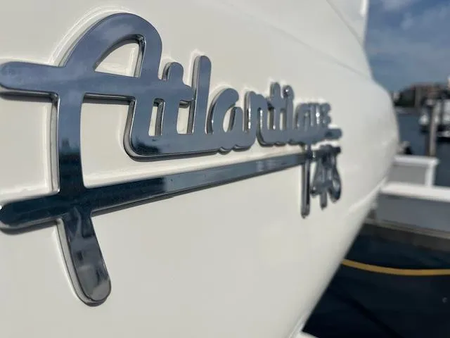 L Altro G Yacht Photos Pics Cranchi Atlantique 48 yacht emblem, 2006 model, close-up view.
