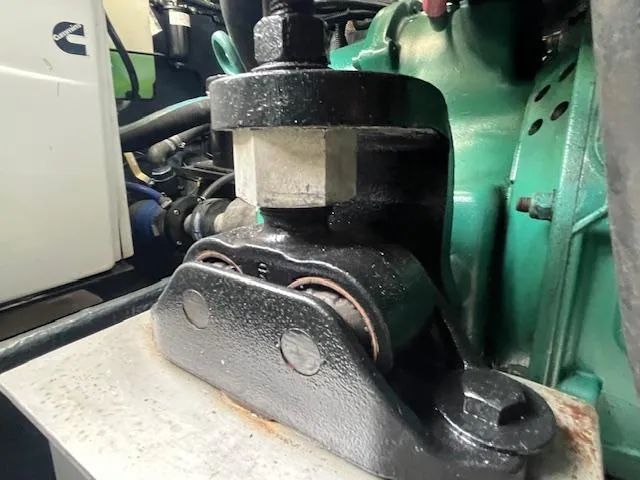 L Altro G Yacht Photos Pics Engine component of a 2006 Cranchi Atlantique 48 yacht, showcasing mechanical details.