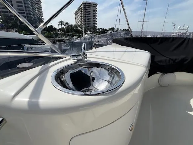 L Altro G Yacht Photos Pics Luxury yacht Cranchi Atlantique 48, 2006 model, featuring a sleek outdoor sink area.