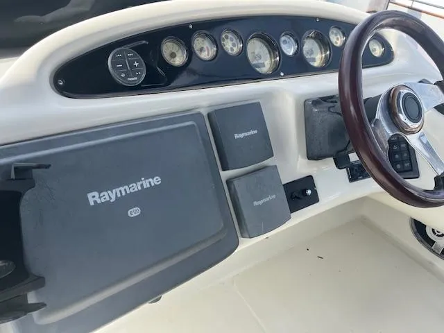 L Altro G Yacht Photos Pics Control panel of 2006 Cranchi Atlantique 48 yacht with Raymarine navigation system.