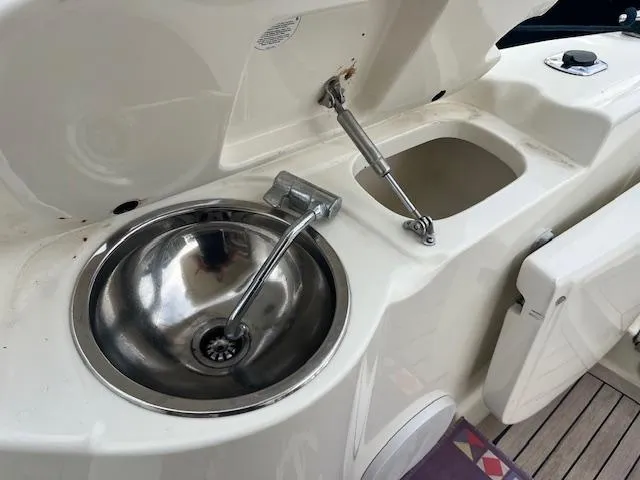 L Altro G Yacht Photos Pics 2006 Cranchi Atlantique 48 yacht sink and storage area on deck.