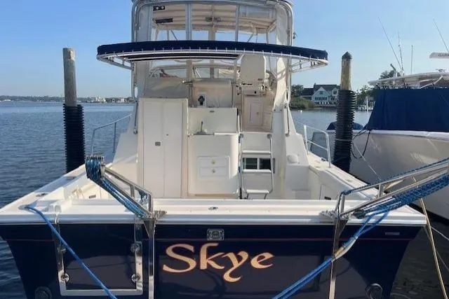  Yacht Photos Pics 2002 Albin 32 + 2 Command Bridge boat named "Skye" docked at a marina.