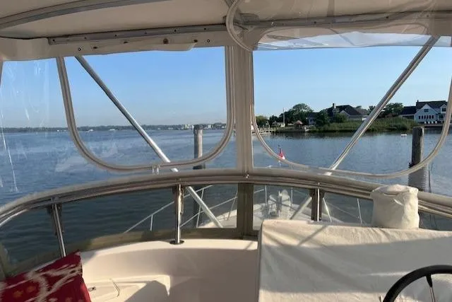  Yacht Photos Pics 2002 Albin 32 + 2 Command Bridge interior with scenic waterfront view.