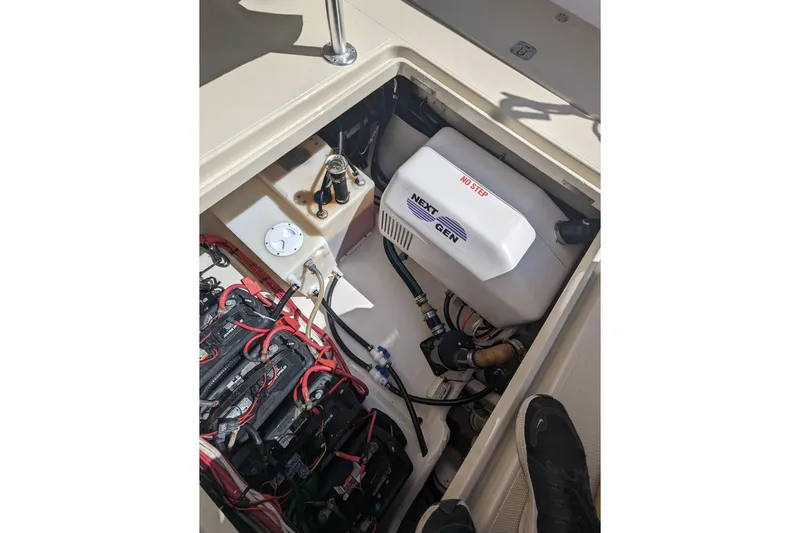 'why Knot' Yacht Photos Pics Engine compartment of 2008 Donzi 38 ZSF with Next Gen generator and wiring.