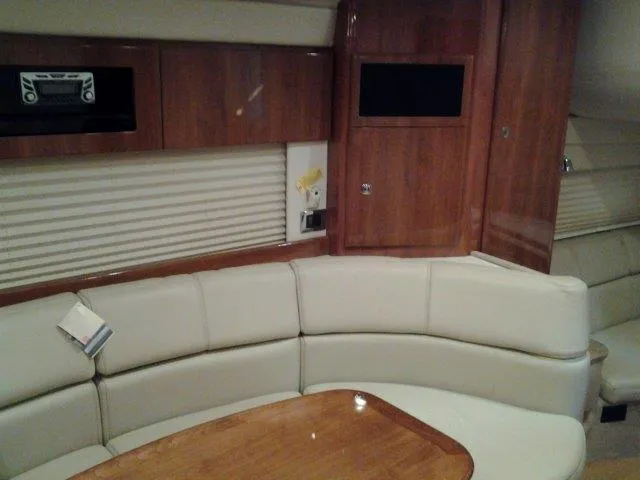  Yacht Photos Pics Interior of 2017 Formula 40 Performance Cruiser with leather seating and wooden cabinetry.