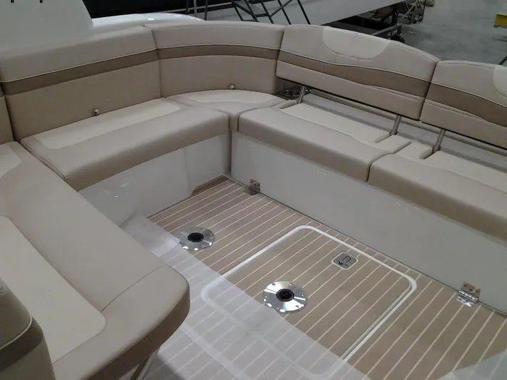  Yacht Photos Pics 2017 Formula 40 Performance Cruiser interior with beige seating and wood-patterned flooring.