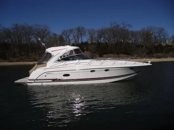  Yacht Photos Pics 2017 Formula 40 Performance Cruiser on calm water, side view.