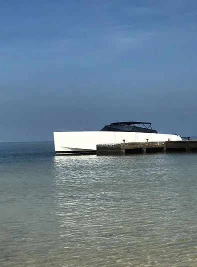 Geminis Yacht Photos Pics VanDutch 55 yacht docked at a pier, 2014 model.