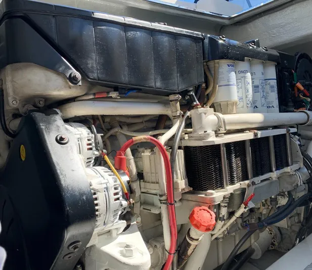 Geminis Yacht Photos Pics Engine compartment of a 2014 VanDutch 55 yacht, showcasing detailed mechanical components.