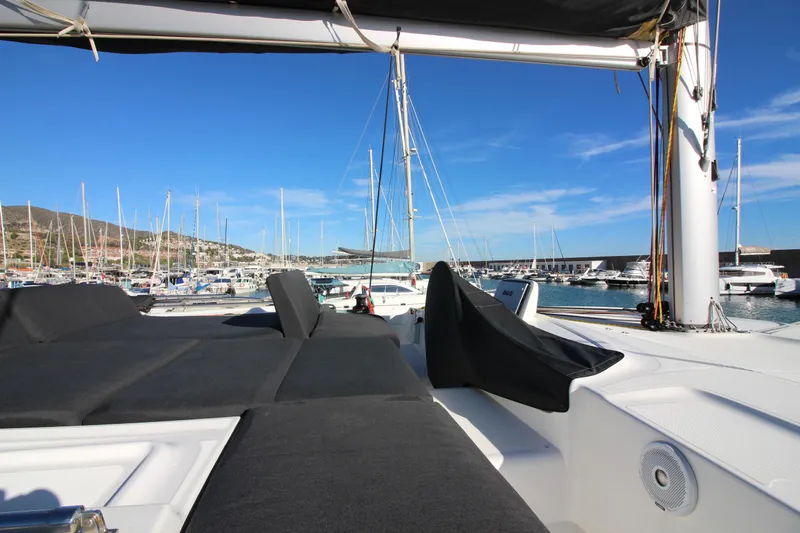 Alma De Sur Yacht Photos Pics Lagoon 46 catamaran deck view in marina, 2021 model, sunny day, clear blue sky.