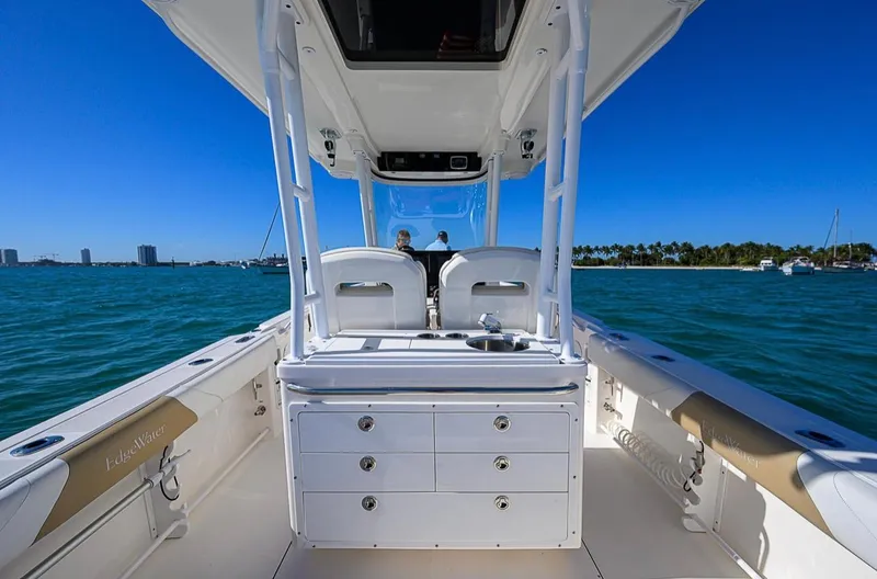  Yacht Photos Pics 2015 Edgewater 320CC boat interior with ocean view and clear blue sky.
