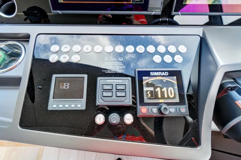 Joie De Vivre Yacht Photos Pics Control panel of a 2020 Sunseeker Manhattan 52 yacht with Simrad navigation display.