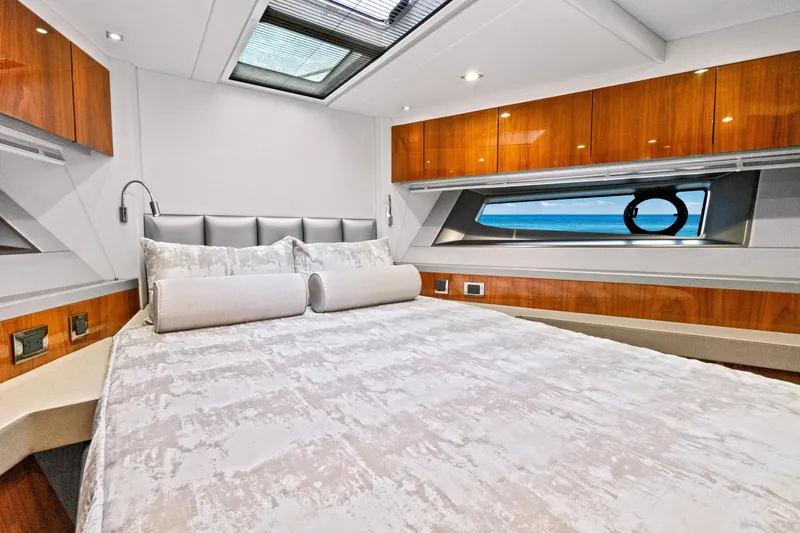Joie De Vivre Yacht Photos Pics Luxurious bedroom interior of 2020 Sunseeker Manhattan 52 yacht with ocean view.