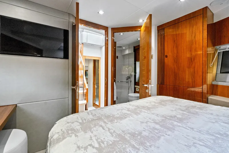 Joie De Vivre Yacht Photos Pics Luxurious interior of 2020 Sunseeker Manhattan 52 yacht bedroom with ensuite bathroom.