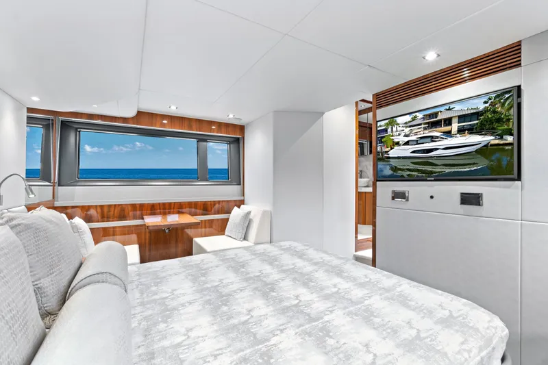 Joie De Vivre Yacht Photos Pics Luxurious interior of 2020 Sunseeker Manhattan 52 yacht with ocean view and modern amenities.