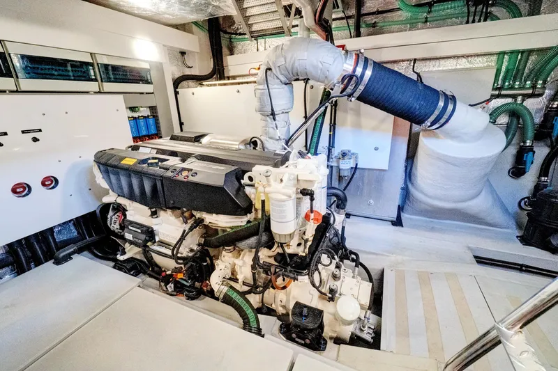 Joie De Vivre Yacht Photos Pics Engine room of 2020 Sunseeker Manhattan 52 yacht, showcasing advanced machinery and components.