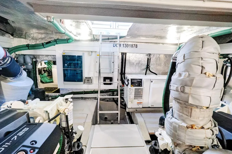 Joie De Vivre Yacht Photos Pics Engine room of 2020 Sunseeker Manhattan 52 yacht, featuring advanced machinery and equipment.