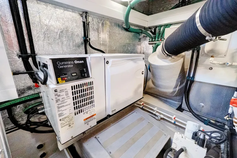 Joie De Vivre Yacht Photos Pics Engine room of 2020 Sunseeker Manhattan 52 yacht with Cummins Onan generator.