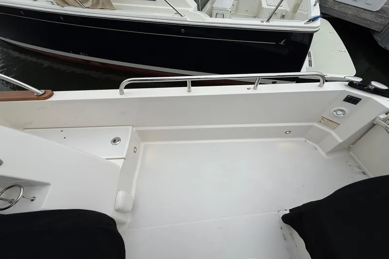 Kay Lee Jean Yacht Photos Pics 2023 Sabre 43 Salon Express boat deck, featuring clean white surface and railing.