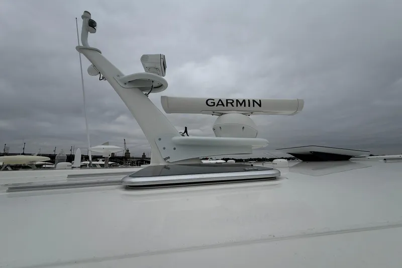 Kay Lee Jean Yacht Photos Pics 2023 Sabre 43 Salon Express with Garmin radar on deck under cloudy sky.