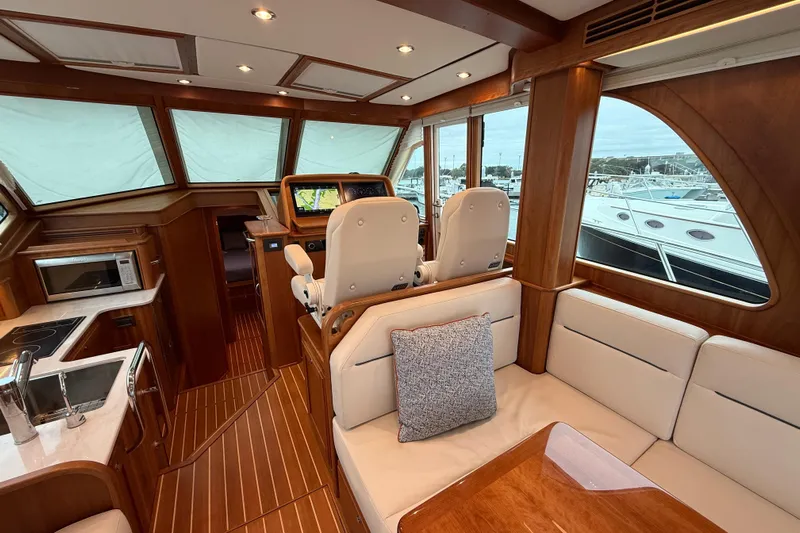Kay Lee Jean Yacht Photos Pics Luxurious interior of 2023 Sabre 43 Salon Express yacht with modern amenities and elegant design.