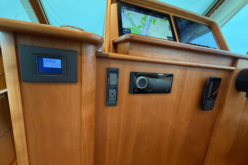 Kay Lee Jean Yacht Photos Pics 2023 Sabre 43 Salon Express dashboard with navigation screens and control panel.