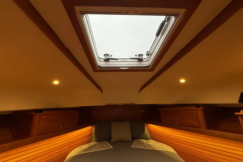 Kay Lee Jean Yacht Photos Pics Luxurious interior of 2023 Sabre 43 Salon Express with skylight and ambient lighting.