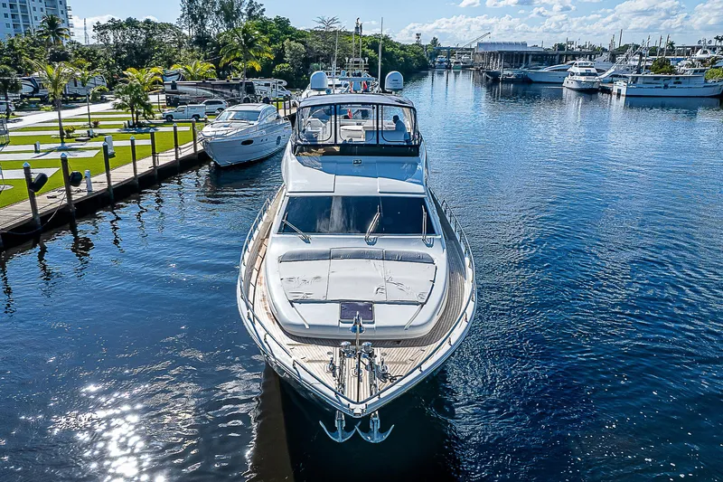La Bella Vita Yacht Photos Pics 2006 Ferretti Yachts 830 docked in a serene marina setting.