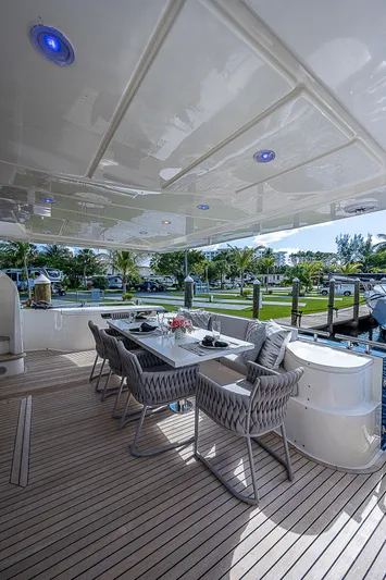 La Bella Vita Yacht Photos Pics 2006 Ferretti Yachts 830 deck with elegant outdoor dining area and modern seating.