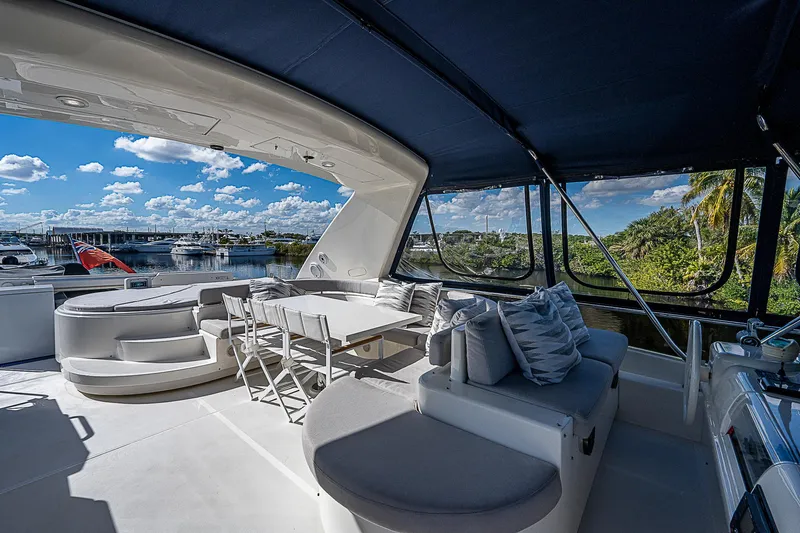 La Bella Vita Yacht Photos Pics Luxurious 2006 Ferretti Yachts 830 with spacious outdoor seating and scenic views.