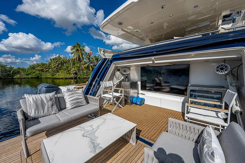 La Bella Vita Yacht Photos Pics Luxurious 2006 Ferretti Yachts 830 with elegant outdoor seating and entertainment area.