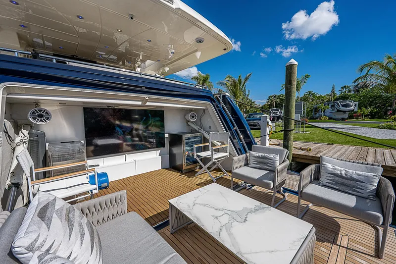 La Bella Vita Yacht Photos Pics Luxury outdoor seating on 2006 Ferretti Yachts 830, featuring elegant design and scenic views.