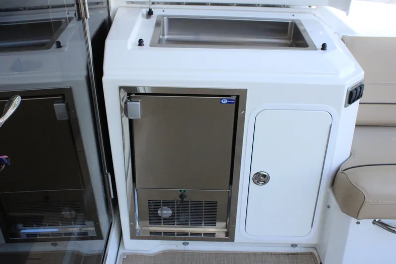 To The Moon And Back Yacht Photos Pics Galley area on a 2014 Cruisers Yachts 45 Cantius.