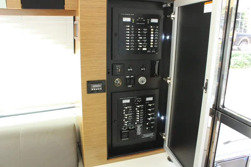 To The Moon And Back Yacht Photos Pics Electrical control panel of 2014 Cruisers Yachts 45 Cantius.