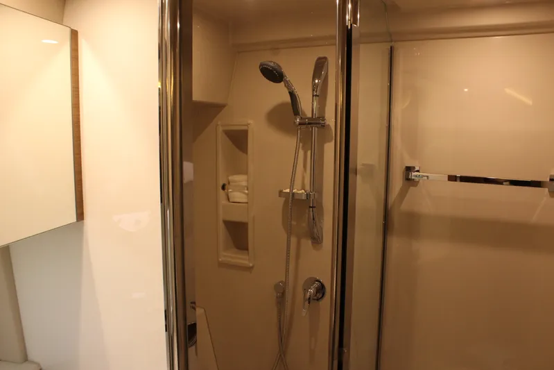 To The Moon And Back Yacht Photos Pics Luxurious shower in a 2014 Cruisers Yachts 45 Cantius.