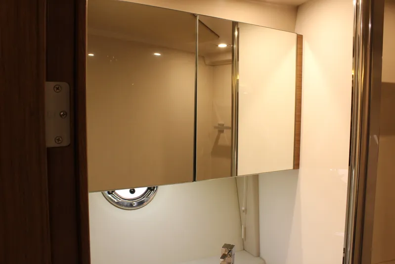 To The Moon And Back Yacht Photos Pics Bathroom in 2014 Cruisers Yachts 45 Cantius with mirrors.
