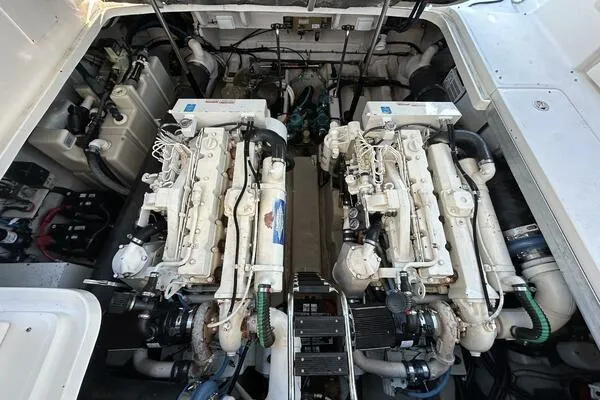  Yacht Photos Pics Engine compartment of a 2003 Sea Ray 420 Sundancer, showcasing dual marine engines.